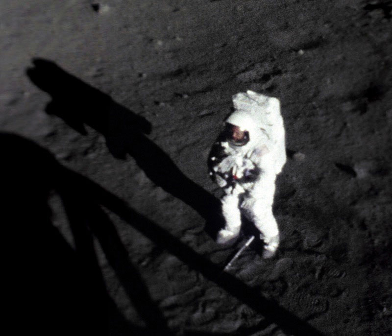 Neil Armstrong on the Moon, with his face visible.